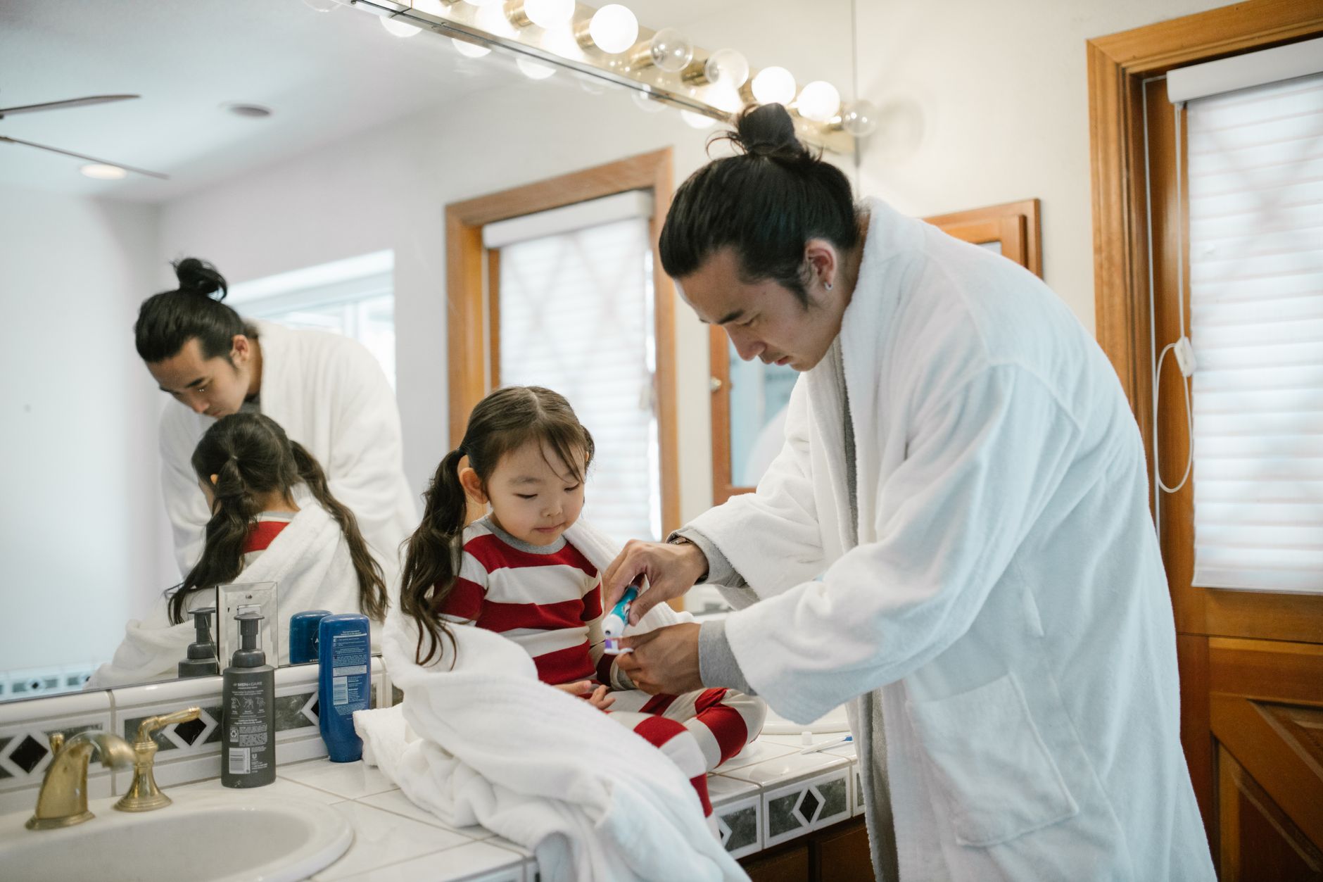 child at dentist with parent