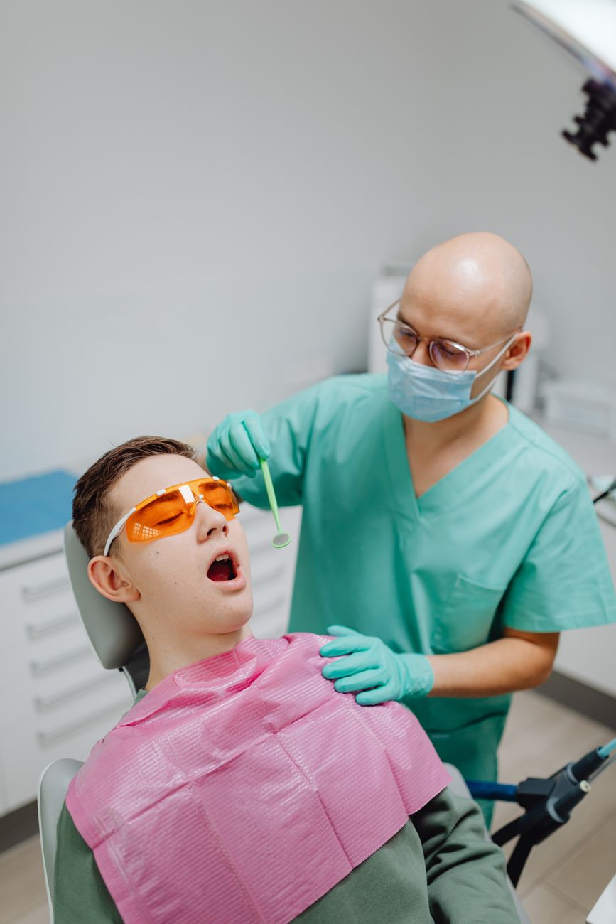 dentist comforting anxious patient